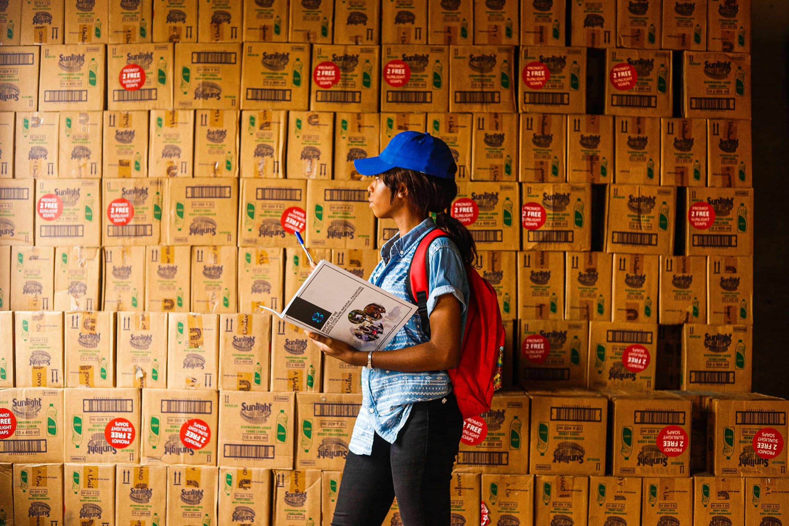 Woman manually counting inventory